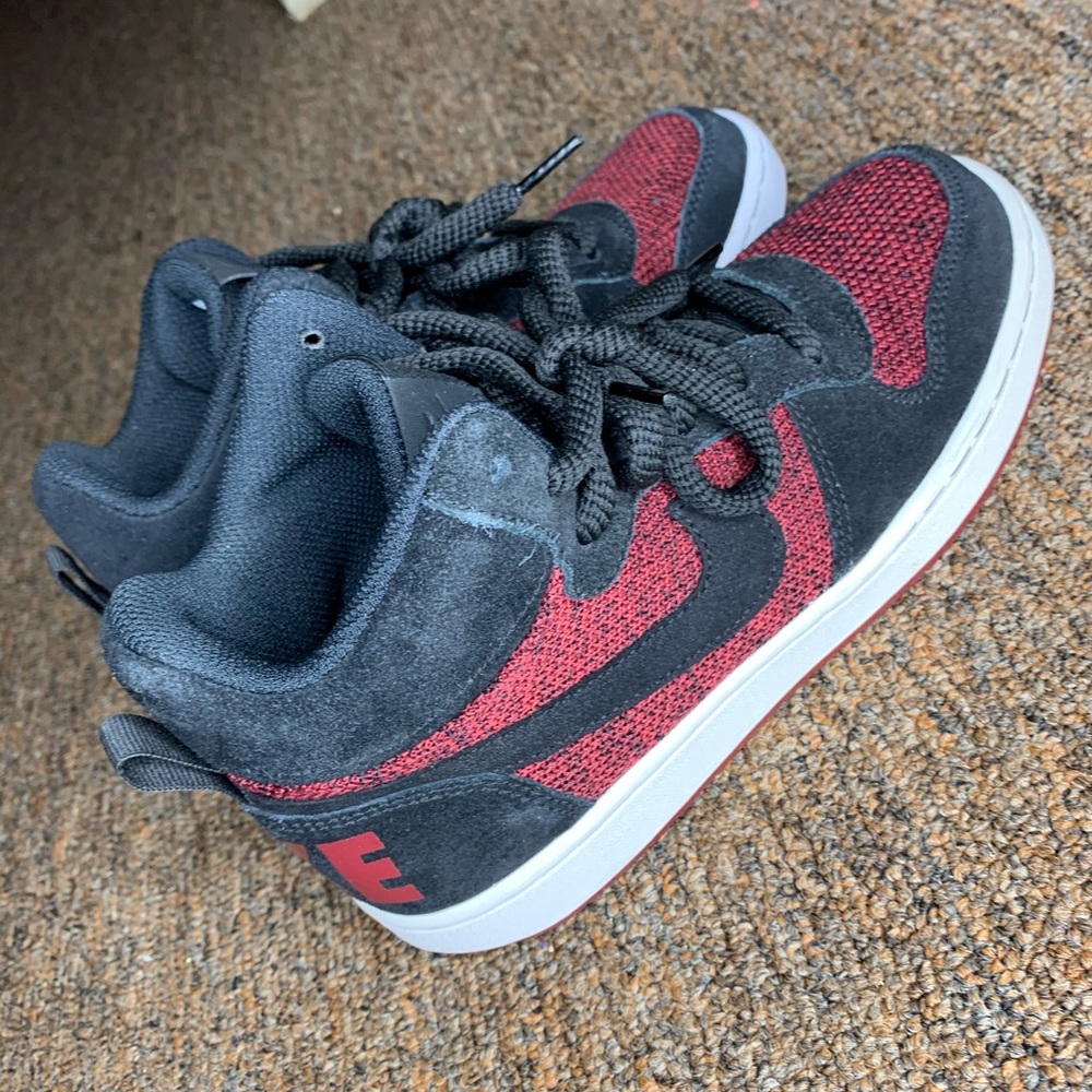 Red and black high top Nike’s
